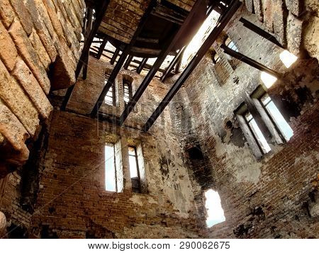 Old Destroyed Tower Of The Former City Baths Inside In Putivl (sumy, Ukraine).  Vintage Background O