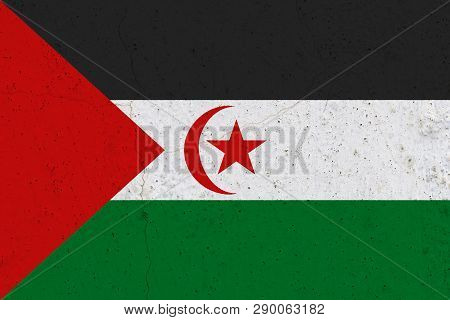 Sahrawi Arab Democratic Republic Flag On Concrete Wall. Patriotic Grunge Background. National Flag O