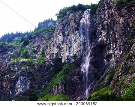 Waterfall Sidensackfall Or Wasserfall Sidensackfall, Spritzbach Stream In The Alpine Valley Of Mader