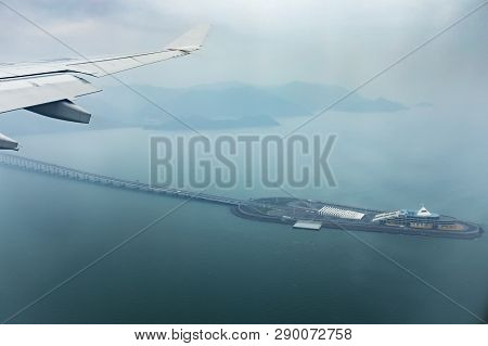 Aerial View From Plane Window Of Hong Kong - Juhai - Macau Bridge Crossing Ocean Harbor