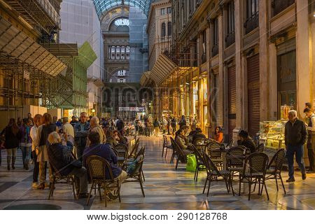 Naples, Italy - October 31, 2015: Unknown People Resting In The Galleria Umberto I At Evening. Galle