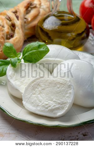 Balls And Pieces Of Buffalo Mozzarella, Soft Italian Scheese Made From The Milk Of Italian Mediterra
