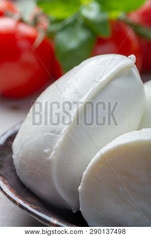 Balls And Pieces Of Buffalo Mozzarella, Soft Italian Scheese Made From The Milk Of Italian Mediterra
