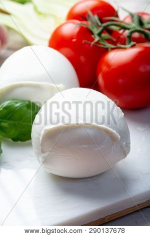 Balls Of Buffalo Mozzarella, Soft Italian Scheese Made From The Milk Of Italian Mediterranean Buffal