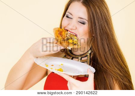 Young Woman Eating Hot Fresh Pizza Slice. Delicious Fast Food Meal. People, Italian Cuisine Concept.