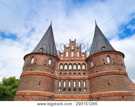 Holsten Gate Or Holstentor Is Medieval Gate Of City Lubeck, Germany, June 2017. Main Landmark Of Lub