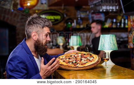 Cheat Meal Concept. Hipster Hungry Eat Italian Pizza. Pizza Favorite Restaurant Food. Fresh Hot Pizz