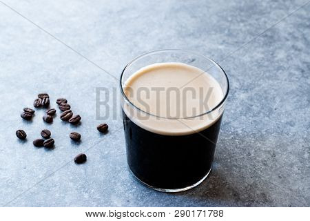 Frothy Cold Brew Nitro Coffee With Beans Ready To Drink.