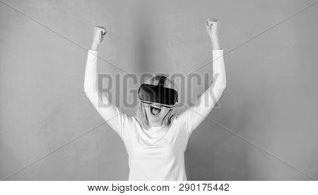 Confident Young Woman Adjusting Her Virtual Reality Headset And Smiling. Woman Using Vr Device. Augm