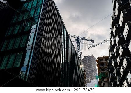 Warsaw Poland. February 18, 2019. Glass Skyscrapers Of Irregular Shape. Bottom View. Abstract Archit