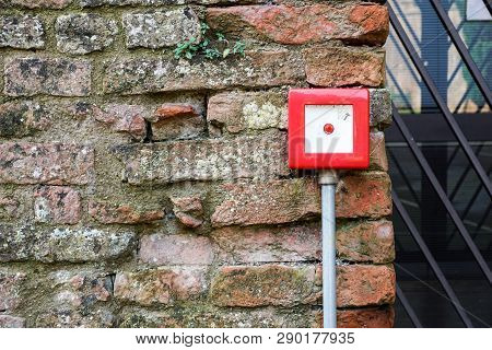 Fire Alarm Box On White Cement Wall For Security Warning Alert, Push Button Fire Alarm In The Buildi