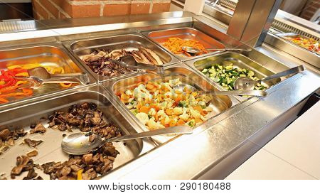 Self Service Restaurant With Many Raw And Cooked Foods