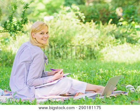 Stay Free With Remote Job. Managing Business Remote Outdoors. Woman With Laptop Sit Grass Meadow. Be