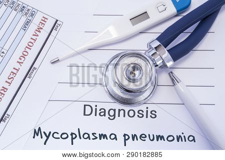 Diagnosis Of Mycoplasma Pneumonia. Stethoscope, Electronic Thermometer, Blood Test Results Are On Me