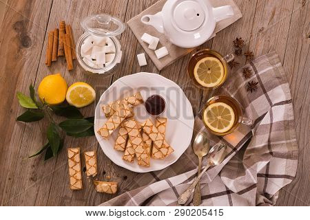 Puff Pastry Cookies With Jam On White Dish.