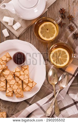 Puff Pastry Cookies With Jam On White Dish.