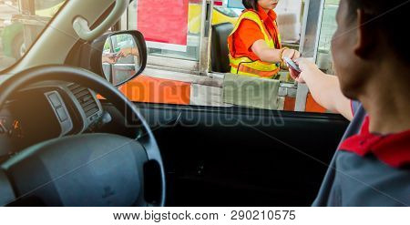 Selective Focus To Driver Pay For The Expressway