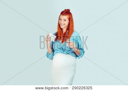 Happy Girl Taking Pills During Pregnancy