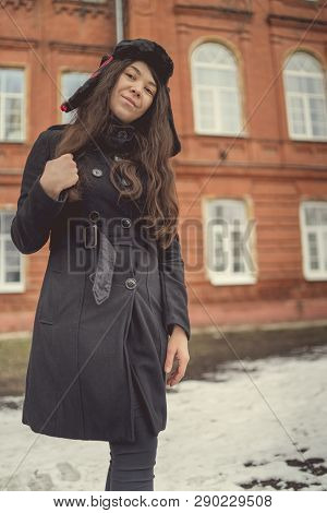 Portrait Of A City Girl In A Blue Jacket. Girl Walking In The Fresh Air