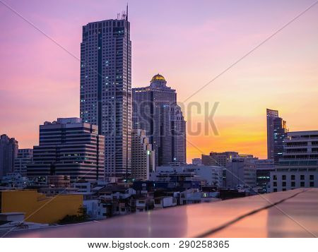 Sunset Of City Tower On Landscape ,in Light Sky