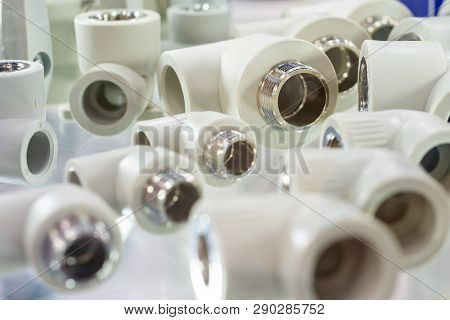 Ppr Plumbing Connection Fittings For Plastic Pipes. Abstract Industrial Background.