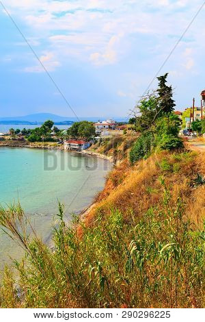 Turquoise Sea Bay And Old Port Of Nea Potidea Or Nea Poteidea In Peninsula Kassandra, Chalkidiki, Gr