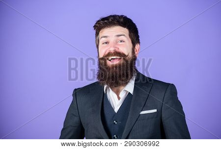 Fashion Concept. Impeccable Style. Businessman Fashionable Outfit Stand Violet Background. Man Beard