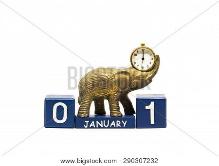 Isolated Calendar Of Cubes With A Bronze Anticue Elephant With A Clock On A White Background