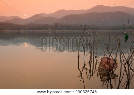 Villagers Are Catching Fish By Fish Trap (net Trap) In Reservoir