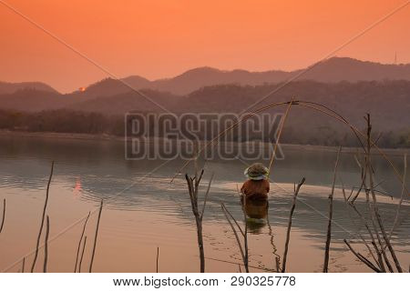 Villagers Are Catching Fish By Fish Trap (net Trap) In Reservoir
