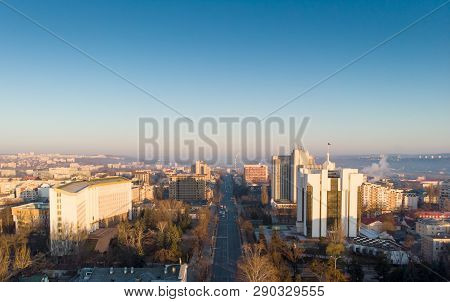 Aerial Drone View Of Stefan Cel Mare Central Boulevard At Sunrise In Chisinau With Cars, Moldova