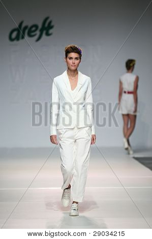 ZAGREB, CROATIA - NOVEMBER 25: Fashion model wears clothes made by Nino Bollag on 'Fashion Week Zagreb' show on November 25, 2011 in Zagreb, Croatia.
