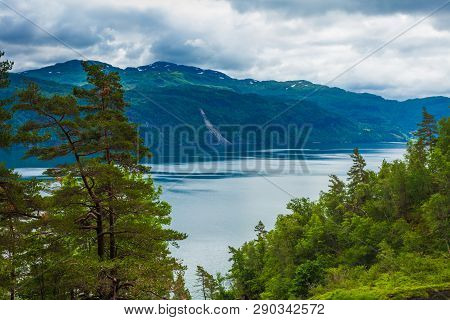 Norwegian Landscape. Green Mountains Hills And Fjord Saudafjord On Overcast Weather, View From Svand