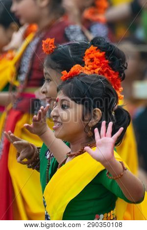 Kolkata, India - March 1, 2018 : Young Girl Dancers Dressed In Yellow And Green Coloured Sari - Trad