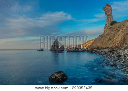 Nerja, Malaga, Andalusi, Spain - February 7, 2019: Playa Del Molino, Small Stone Beach With Three La