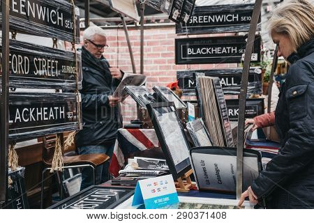 London, Uk - March 16. 2019: People Looking At Posters And Home Decor On Sale At A Stall In Greenwic