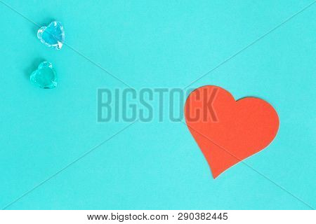 Blue Background With Red Hearts. Gobo Mask Light Effect In The Shape Of A Heart.