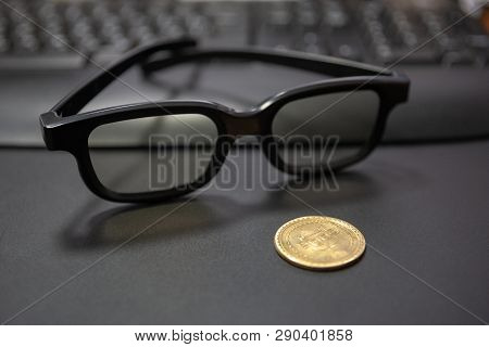 Bitcoin Cryptocurrency Concept.glasses And Desktop Keyboard At Background. Stock And Exchange Ocupat