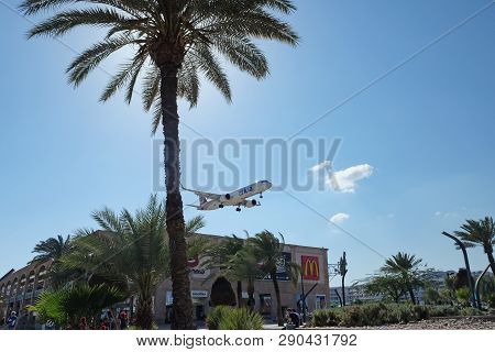 Eilat, Israel - March 06, 2019: Aircraft Of The Company Arkia Goes On Landing Low Over The City Eila
