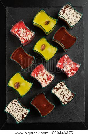 Mini Dessert, Tiramisu, Chocolate And Strawberry Dessert On Dark Background.