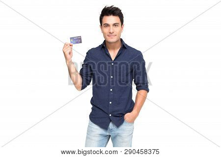 Young Handsome Caucasian Man Smiling, Showing, Presenting Credit Card For Making Payment Or Paying O