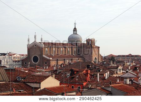 Ancient Church Of Saint Paul And John In Venice In Italy And Many Roofs