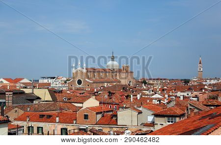 Church Of Saint Paul And John In Venice In Italy And Many Roofs Of The Houses