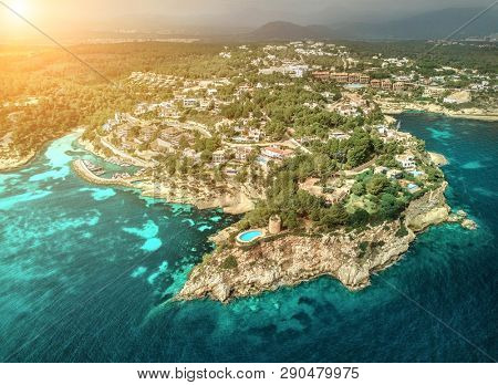 Beautiful birdeye view on the sea coastline with pier and yakhts at sunny day. Travell, jorney,islands, Seascape, freedom, holidays concept.
