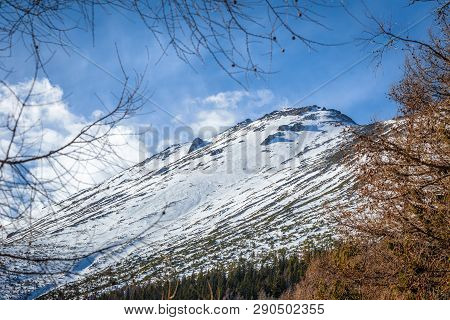 View Of The Landscape With Snowy Mountains In The Background. The Slavkovsky Stit - Peak In High Tat