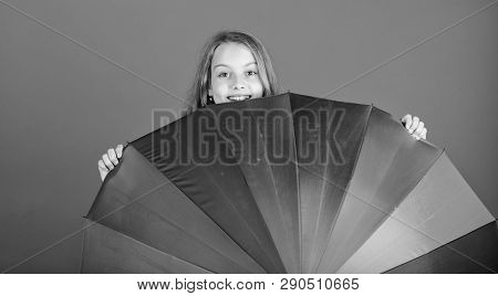 Stay Positive Though Rainy Day. Brighten Up Life. Kid Peek Out Colorful Rainbow Umbrella. Color Your