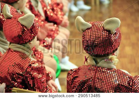 Children In Fancy Dresses On Matinee At Kindergarten