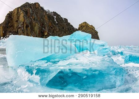 Cape Khoboy Rock On Olkhon Island, Lake Baikal, Ice Hummocks In Winter, Russia, Siberia