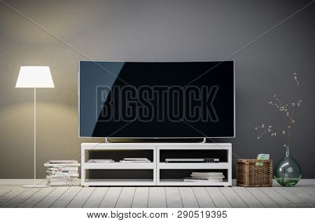 Tv display with blank screen against the gray wall in the living room