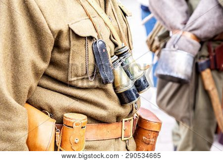 Vintage Leather Holster, Binoculars And Other Ammunition On The Belt. Retro Uniform Of Russian Army 